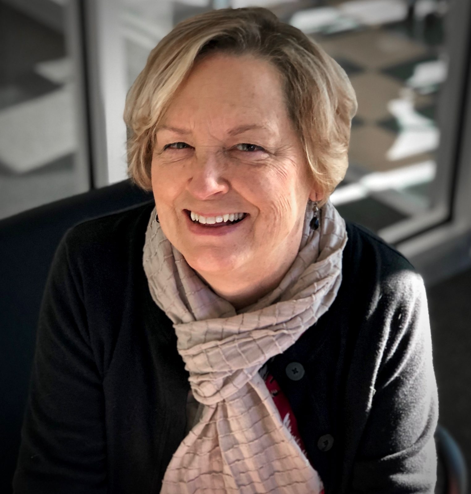 Woman with short hair, smiling